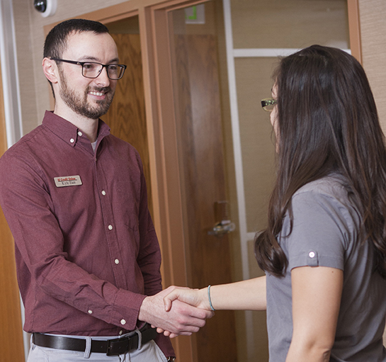 IUCU employee helping a member