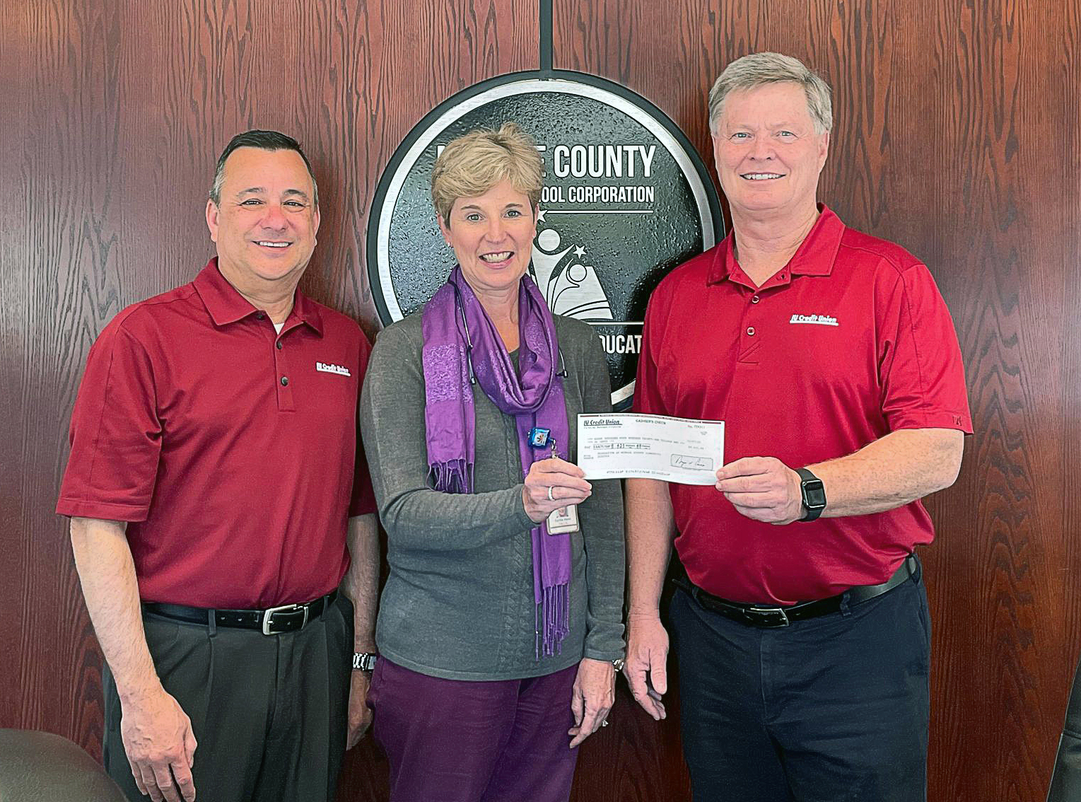 Photo of IUCU donation check to the Foundation of Monroe County Community Schools