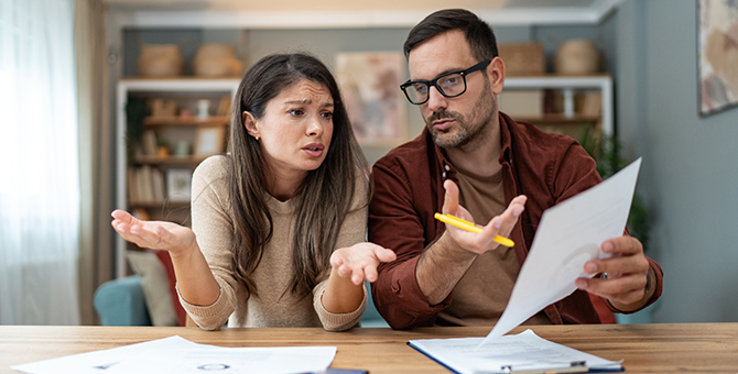 Photo of a couple working on finances