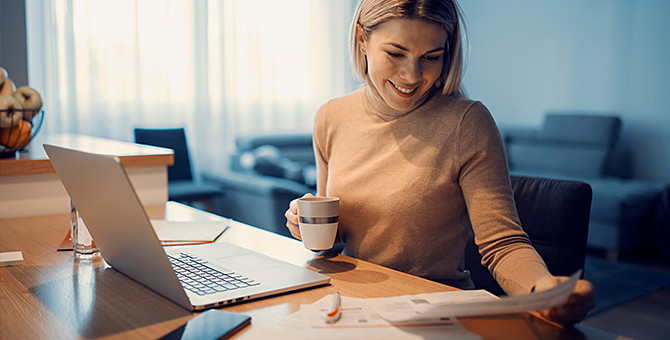 Photo of a woman using a laptop