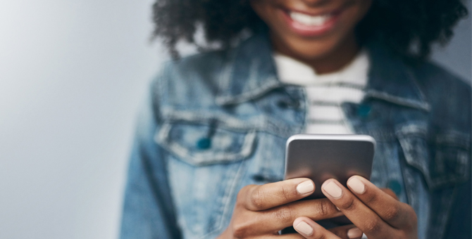 Photo of a woman using mobile device