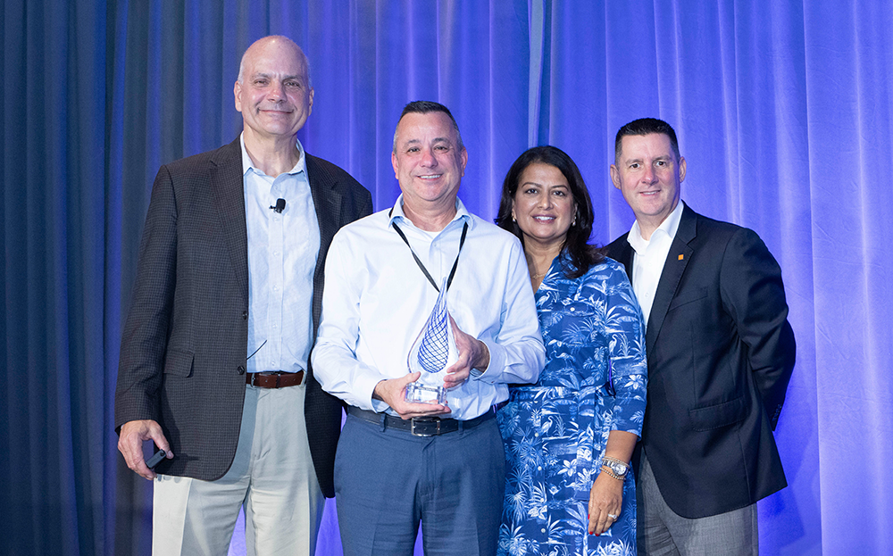 Image of IUCU receiving Raddon Crystal Performance Award