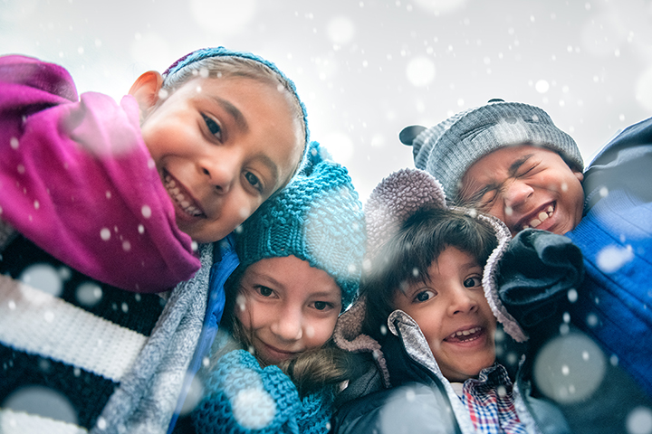 Photo of children wearing winter coats