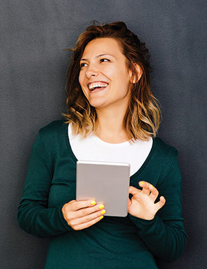 Woman using tablet device